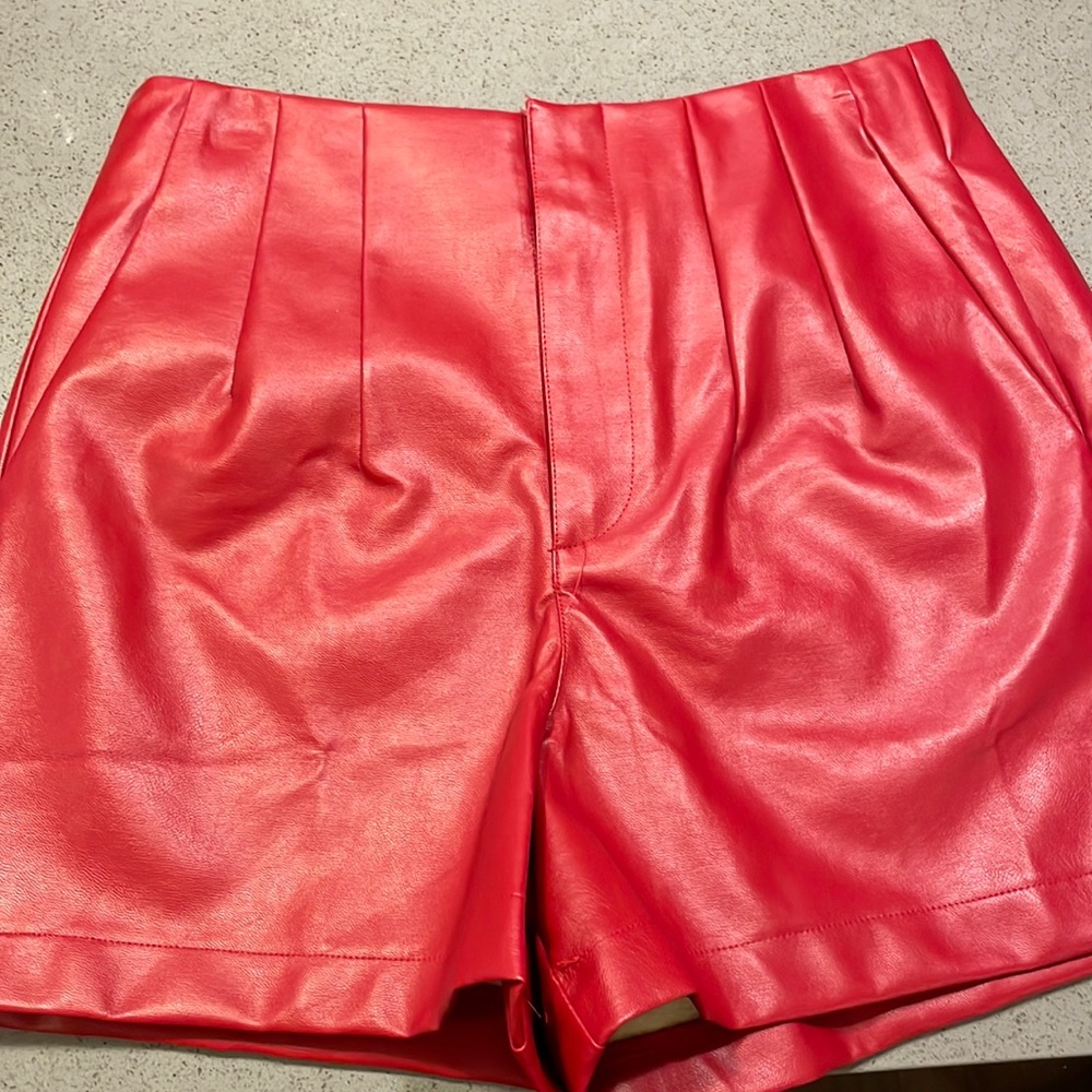 Red leather shorts